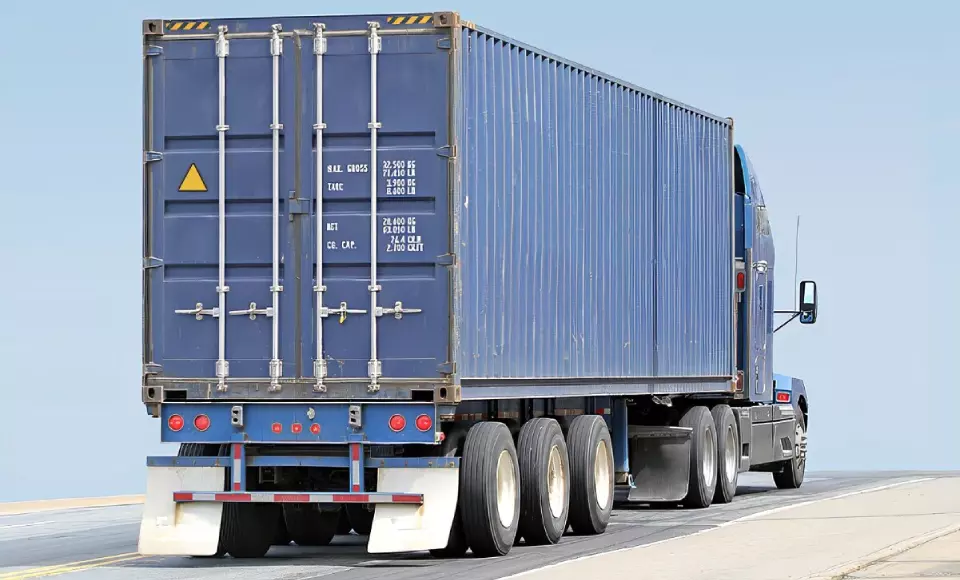 A Semi Transporting an Intermodal Container