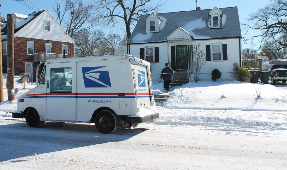 USPS delivering mail in snow